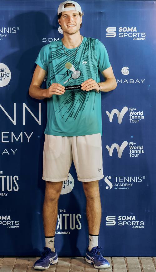 Toby Samuel with the trophy at Soma Bay
